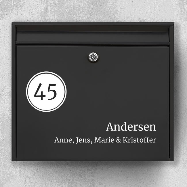 Mailbox nameplate with round number emblem on the left, large serif last name and family line - weatherproof vinyl