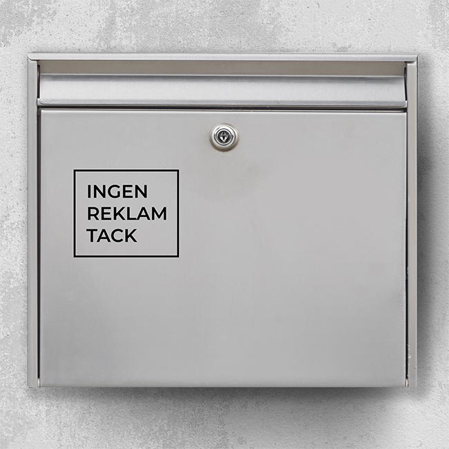 Ad-free mailbox label – minimalist white square with the text “No ads, please” on dark door