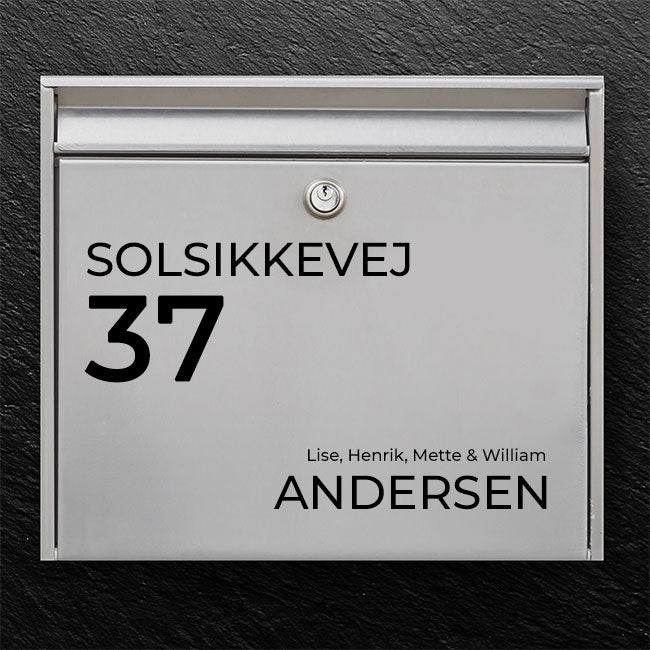 Modern mailbox label with clear house number, street name and family text in sans serif - robust outdoor sticker